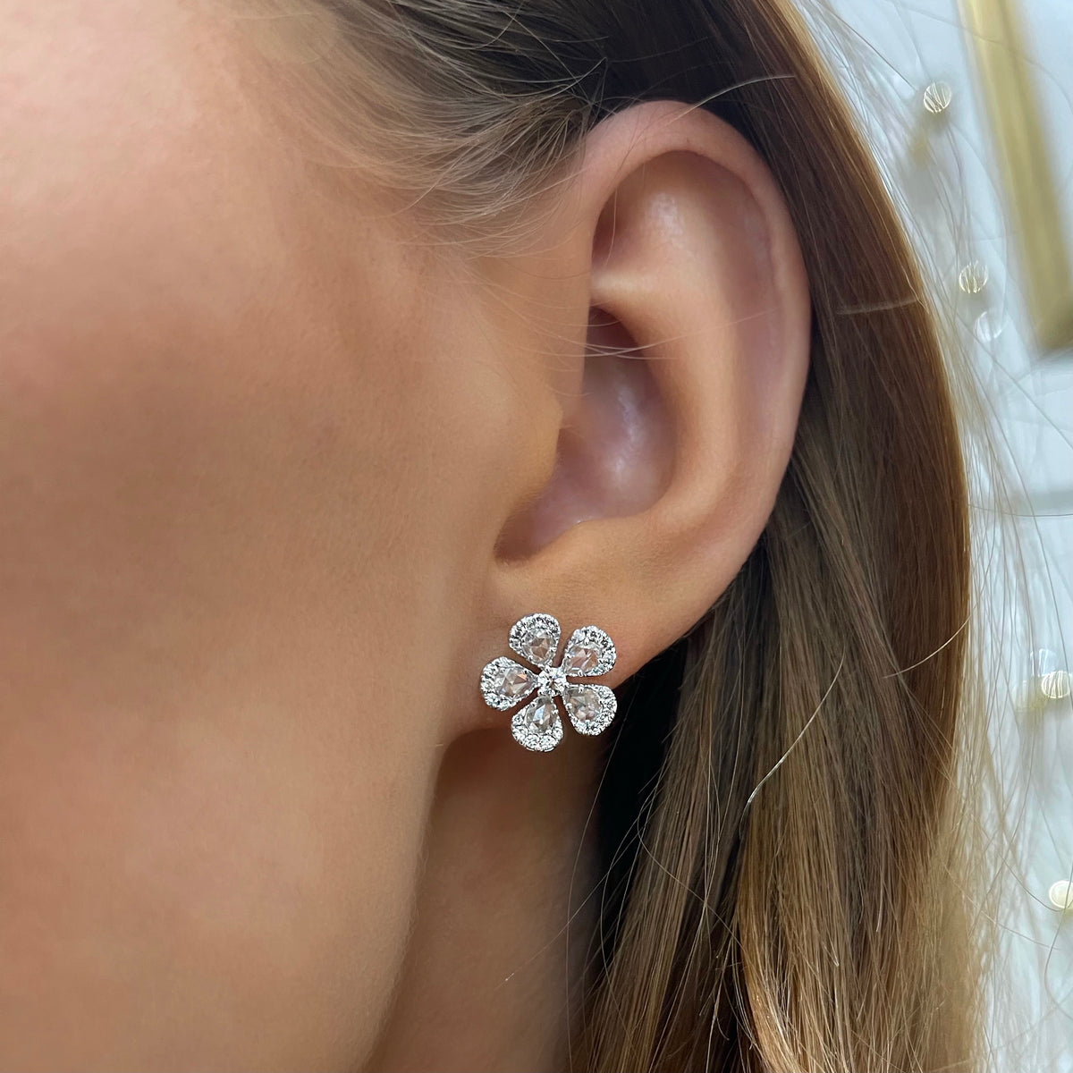 Cleo Diamond Flower Stud Earrings on model