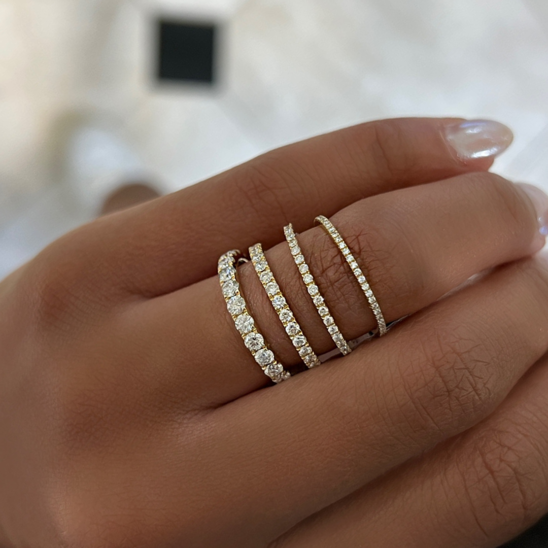 Floating diamond eternity band yellow gold deals