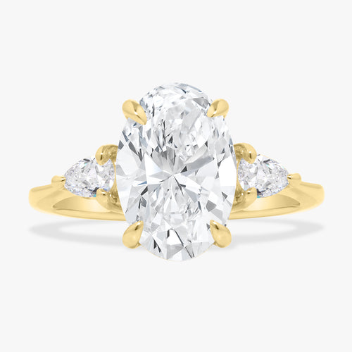 3.06ct Lab Grown Oval Diamond in a Three Stone Pear Setting