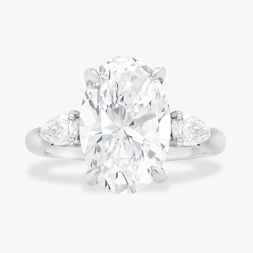 3.51ct Lab Grown Oval Diamond in a Three Stone Pear Setting