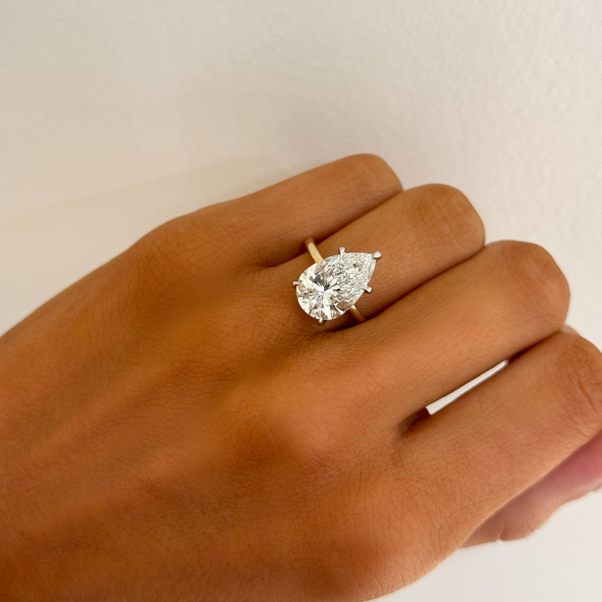 4.51ct Lab Grown Pear Cut Diamond in a Solitaire Setting with Hidden Halo