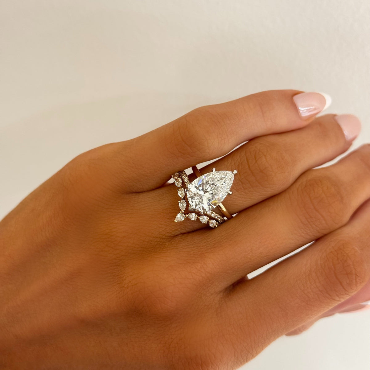 4.51ct Lab Grown Pear Cut Diamond in a Solitaire Setting with Hidden Halo