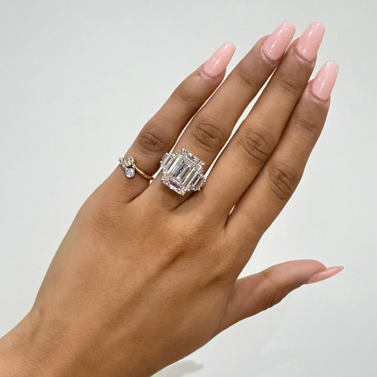 12.26ct Lab Grown Emerald Cut Diamond in a Five-Stone Setting with Step-cut Trapezoids and Tapered Baguettes