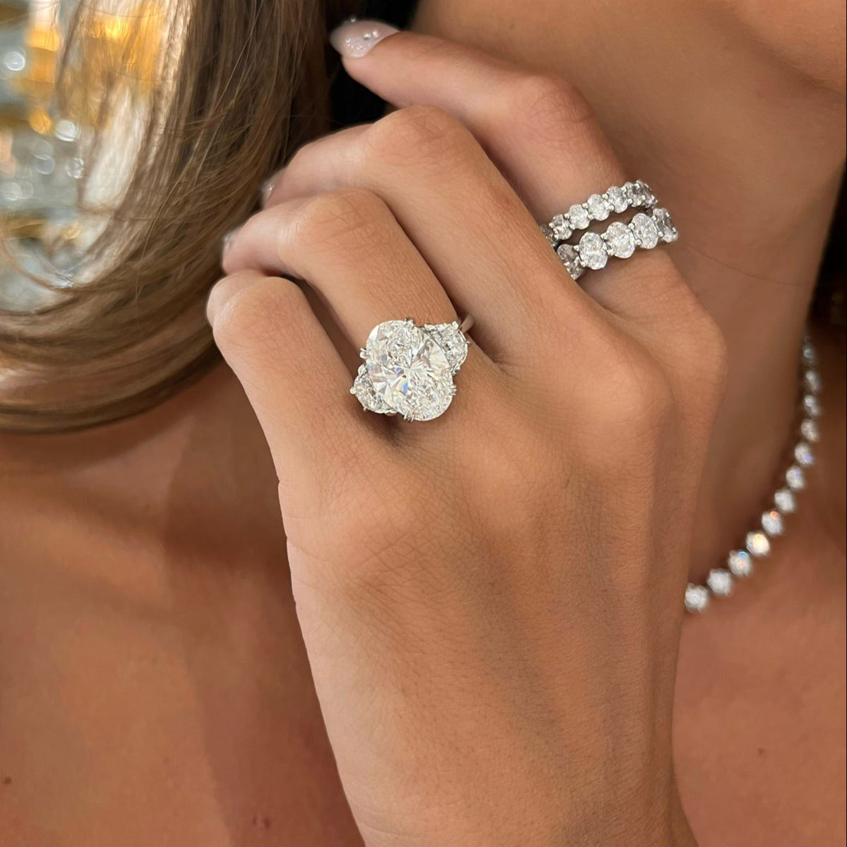 6.01ct Lab Grown Oval Diamond in a Half Moon Setting