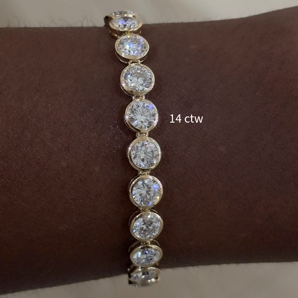 Bixi Bezel Diamond Tennis Bracelet 14 ctw & 22.89 ctw
