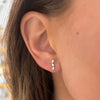  Brixton Three Baguette Diamond Bent Bar Stud Earrings
