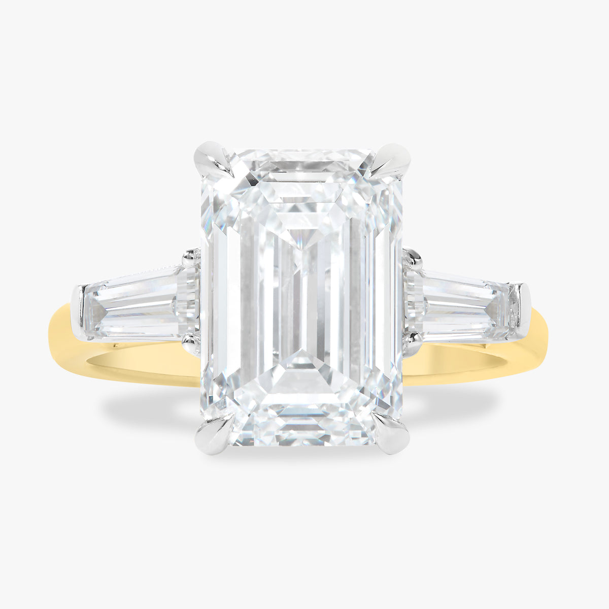 5.00ct Lab Grown Emerald Diamond in a Three-Stone Setting with Tapered Baguettes