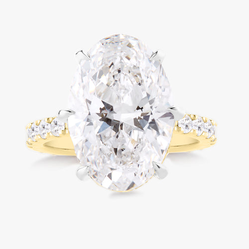 7.14ct Lab Grown Oval Diamond in a Pavé Solitaire with Hidden Halo and Diamonds on the Prongs