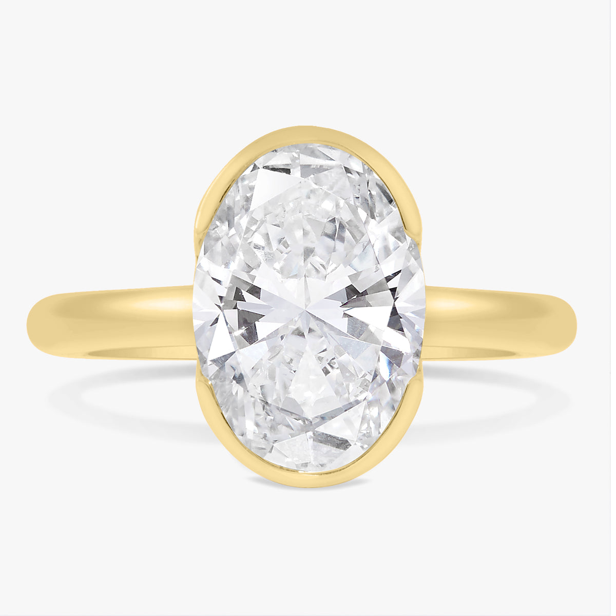 3.01ct Lab Grown Oval Diamond in a Solitaire Half-Bezel Setting