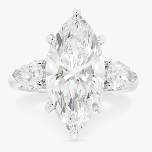 5.09ct Lab Grown Marquise Diamond in a Three-Stone Setting with Pear sides and Diamonds on the Prongs