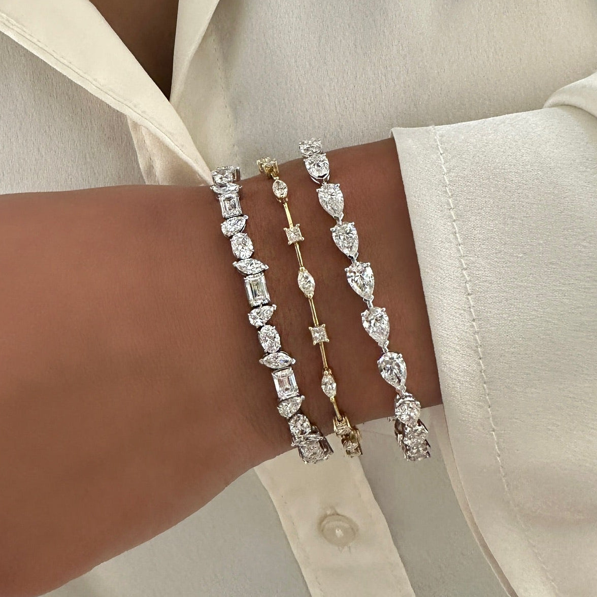 Cosmo Multi Mixed Shape Floating Diamond Tennis Bracelet 2.25 ctw,Everette Chasing Pears Diamond Tennis Bracelet 11.87 ctw