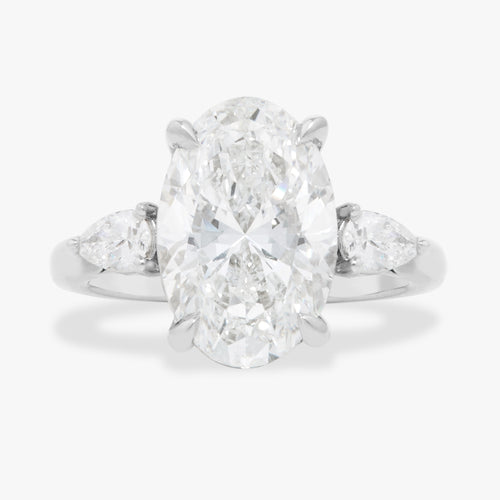 3.51ct Lab Grown Oval Diamond in a Three Stone Pear Setting