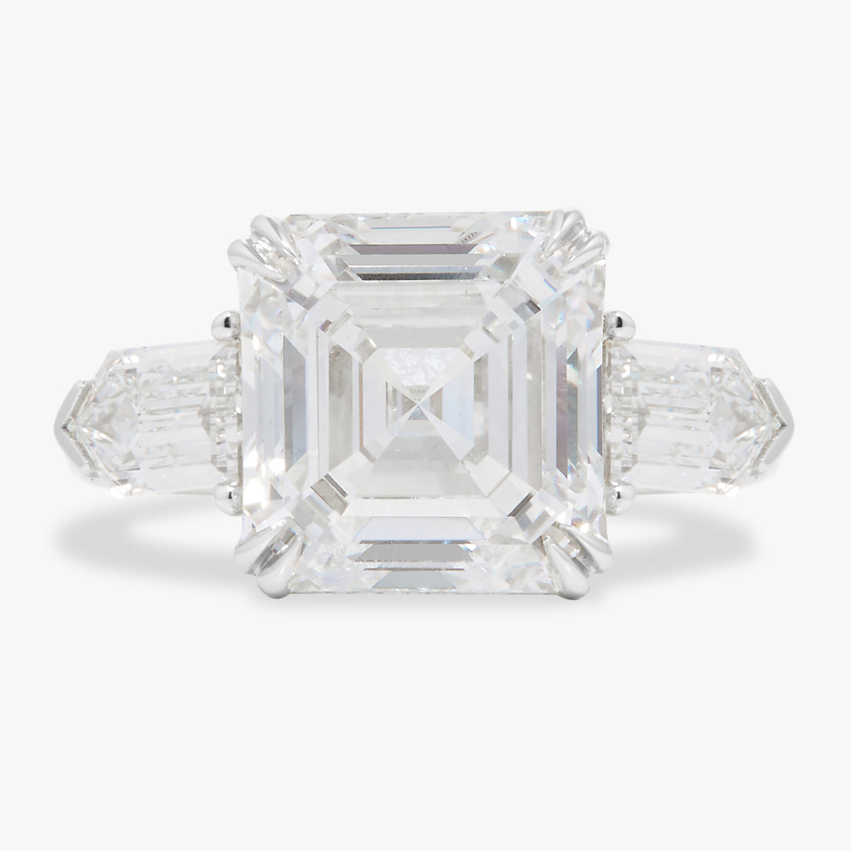 7.04ct Lab Grown Asscher Cut Diamond in a Three Stone Bullet Setting