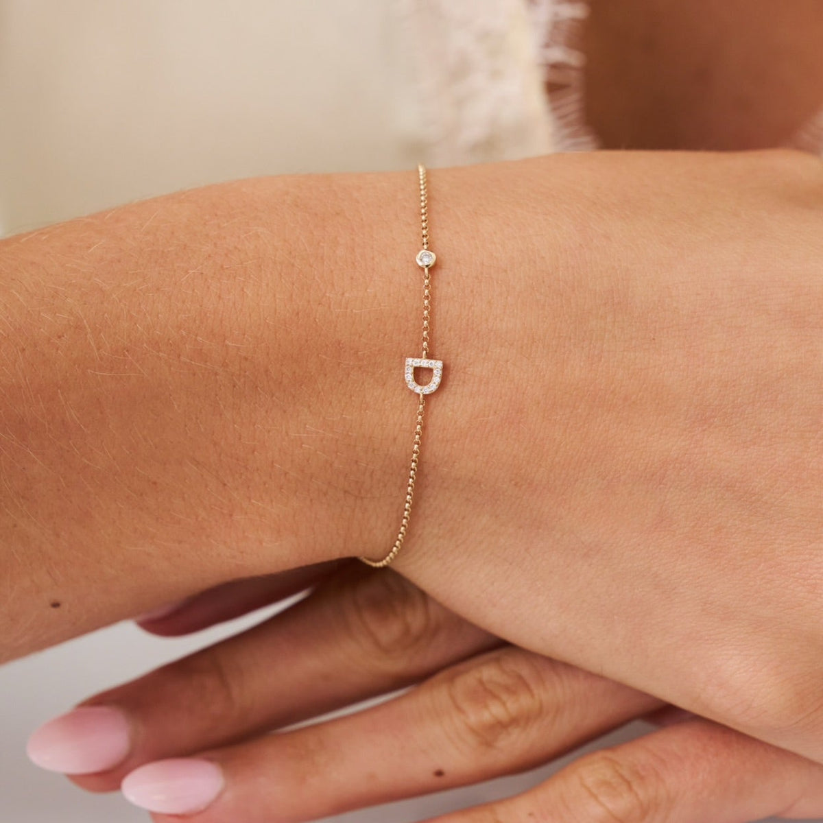 D initial and bezel diamond bracelet