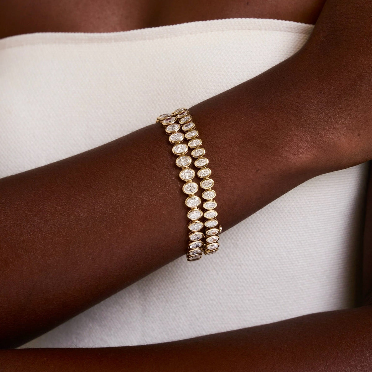 Oval Bezel Set Tennis Bracelet 7.50 ctw & 12.40 ctw