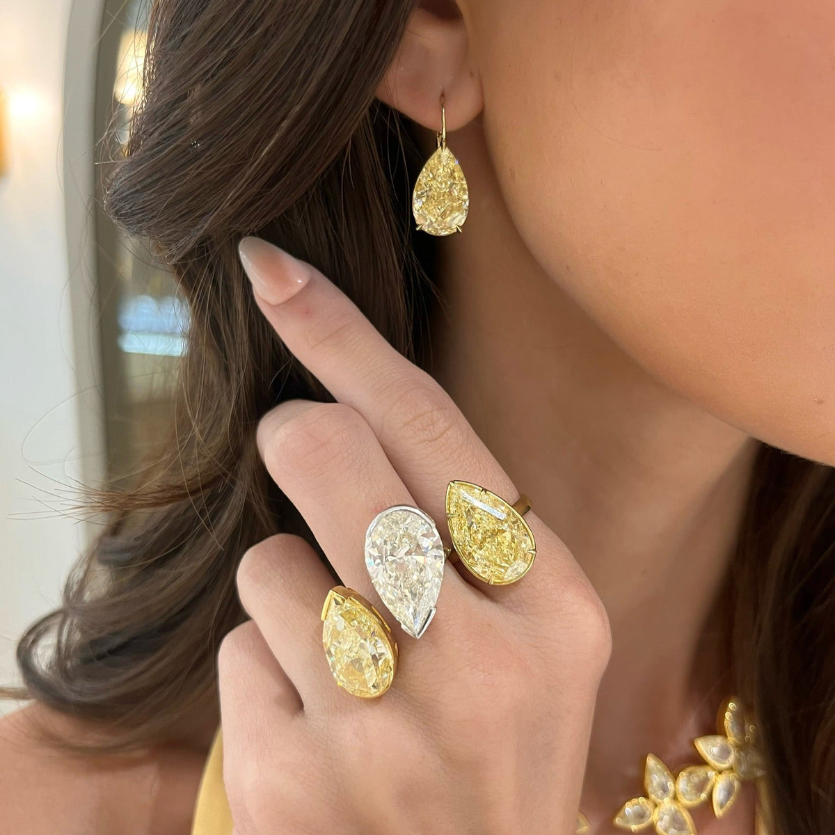 Eliza Fancy Yellow Pear Diamond Dangle Earrings 16.09 ctw, 10.02ct Natural Fancy Yellow Pear Diamond in a Bezel Set Solitaire Setting,10.02ct Natural Fancy Yellow Pear Diamond in a Bezel Set Solitaire Setting
