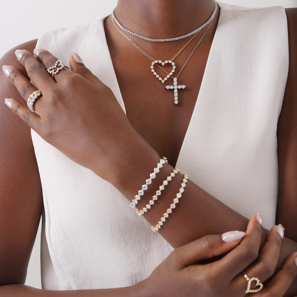 Everleigh Adjustable Diamond Tennis Collar Necklace, Charlie Cloud® midi heart necklace, georgie cross necklace, eternity mamas hoops, mamas Charlie Cloud® bangle, multi way Charlie Cloud® bracelet, Charlie Cloud® butterfly ring    