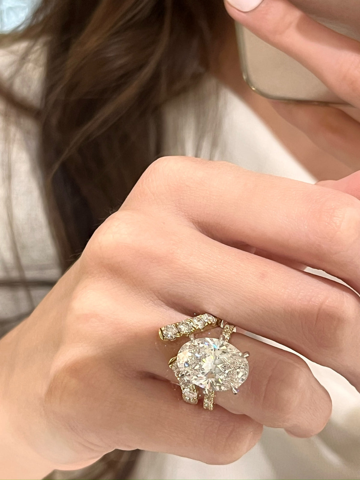 7.14ct Lab Grown Oval Diamond in a Pavé Solitaire with Hidden Halo and Diamonds on the Prongs