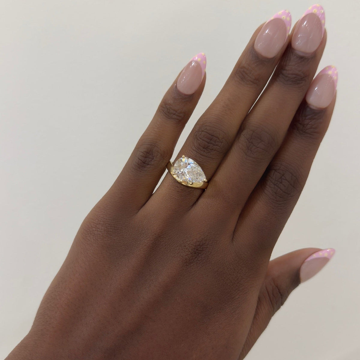 3.52ct Lab Grown Pear Diamond in a East-West Silhouette Curved Solitaire Setting