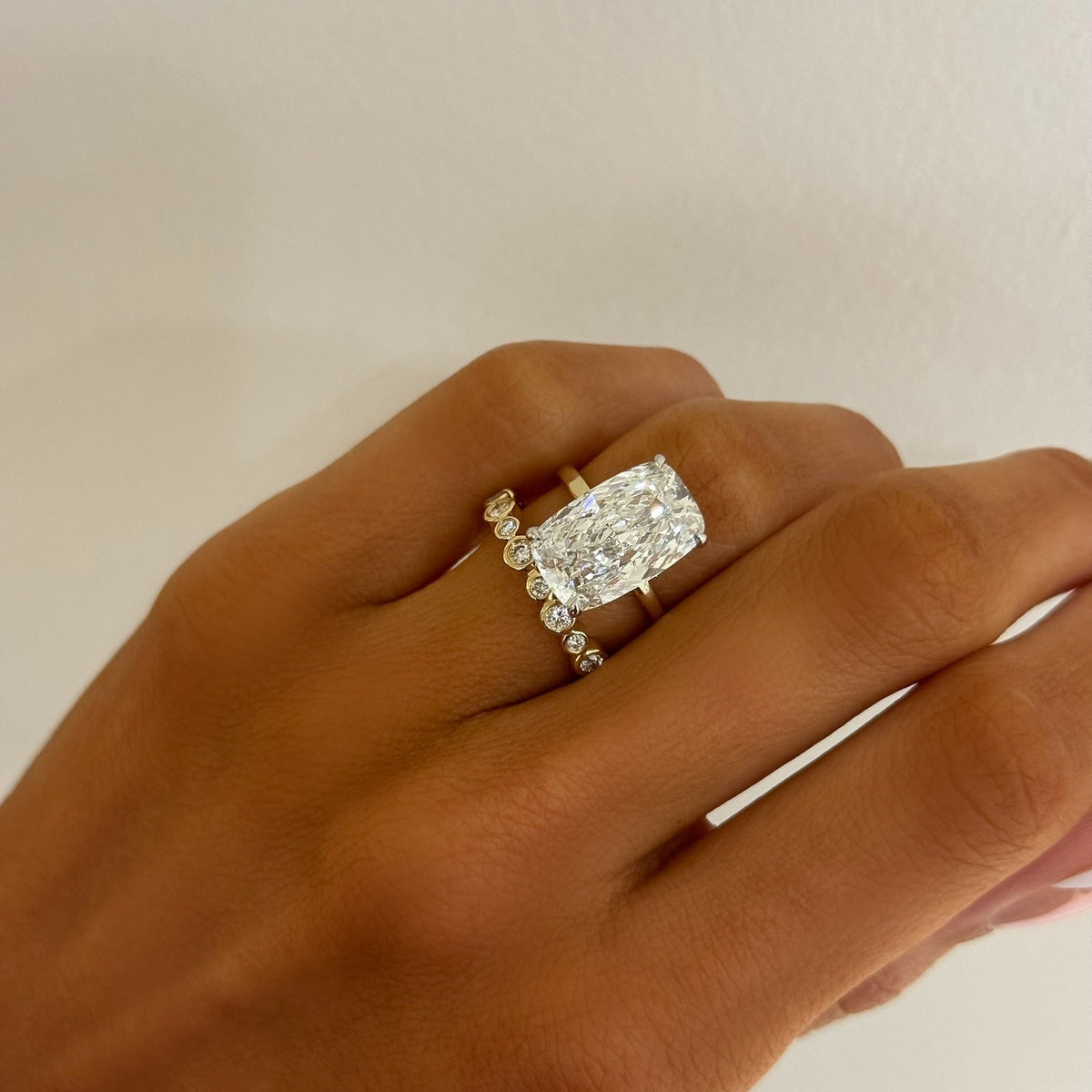 7.05ct Lab Grown Elongated Cushion Cut Diamond in a Solitaire Setting with Diamond Wrap