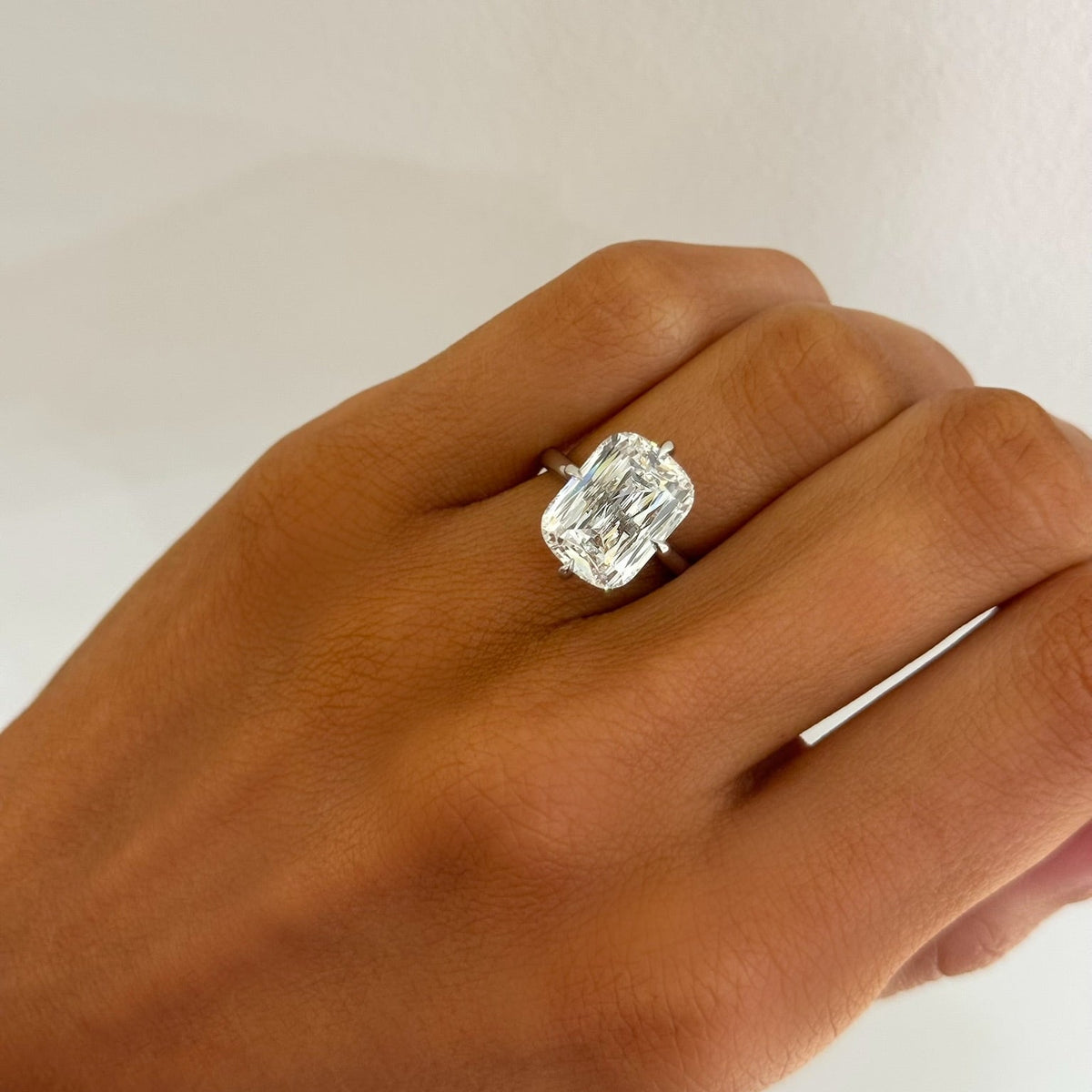 7.09ct Lab Grown Criss Cut Elongated Cushion in a Compass Cathedral Setting