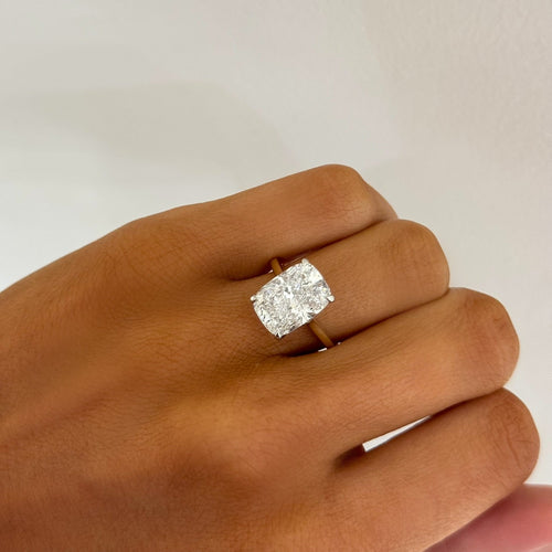 5.13ct Lab Grown Elongated Cushion Diamond in a Cathedral Setting with Hidden Halo and Diamonds on the Prongs