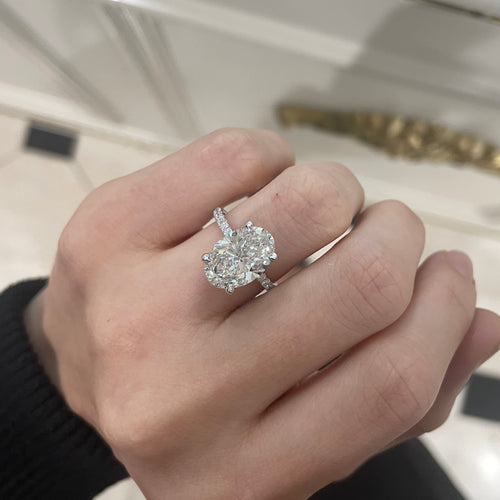 4.04 Oval Cut Lab Grown Diamond in a Solitaire With Pavé