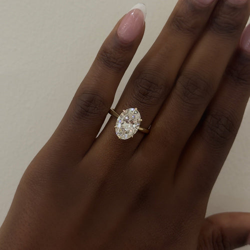 4.03ct Lab Grown Oval Diamond in a 6-prong Tulip Setting with Mini Cathedral