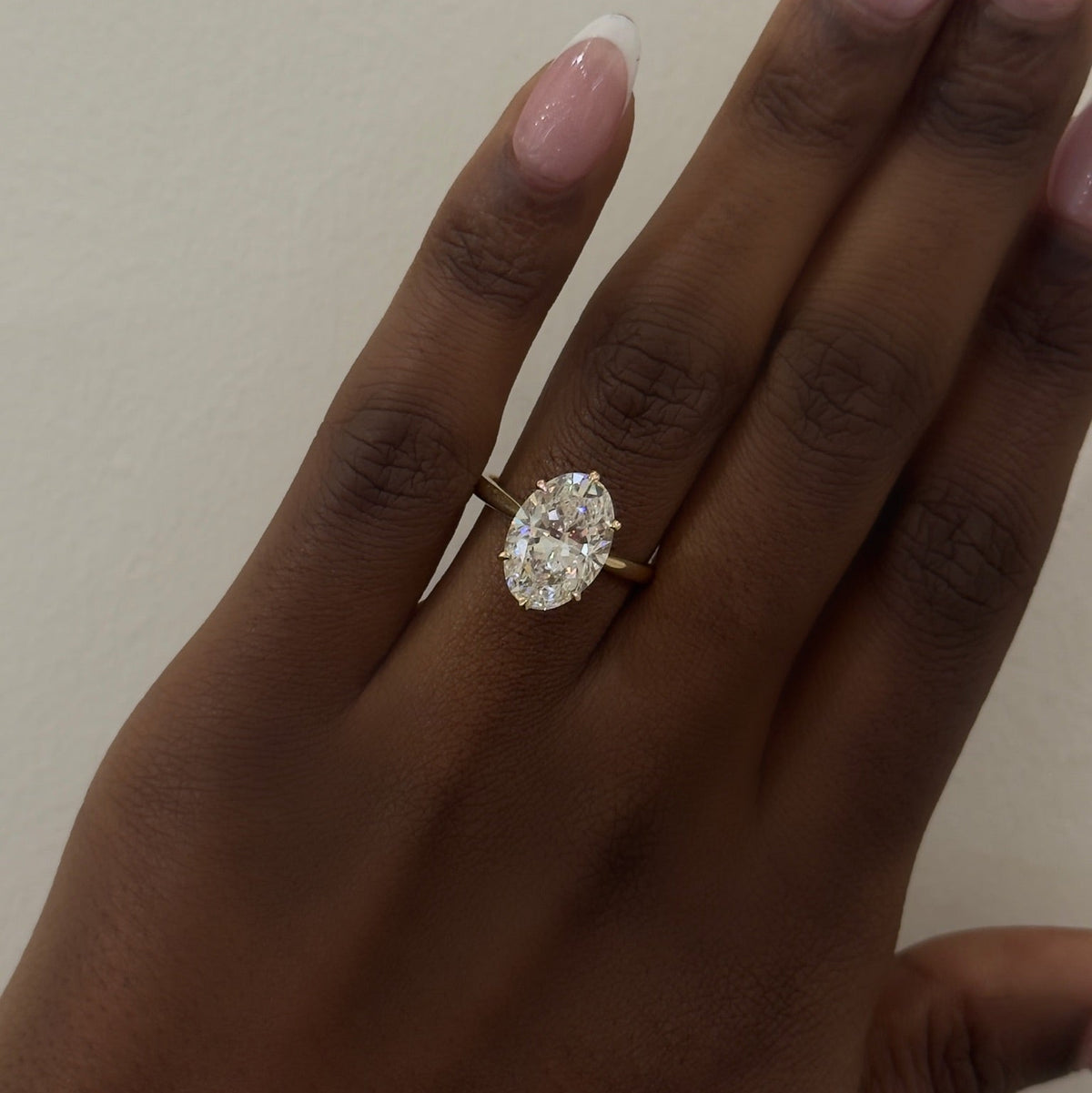 4.03ct Lab Grown Oval Diamond in a 6-prong Tulip Setting with Mini Cathedral