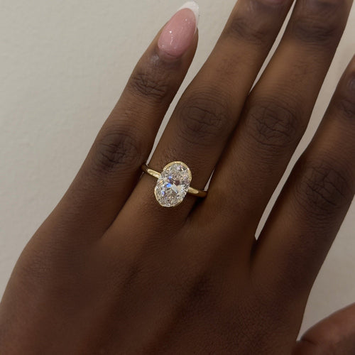 3.01ct Lab Grown Oval Diamond in a Solitaire Half-Bezel Setting