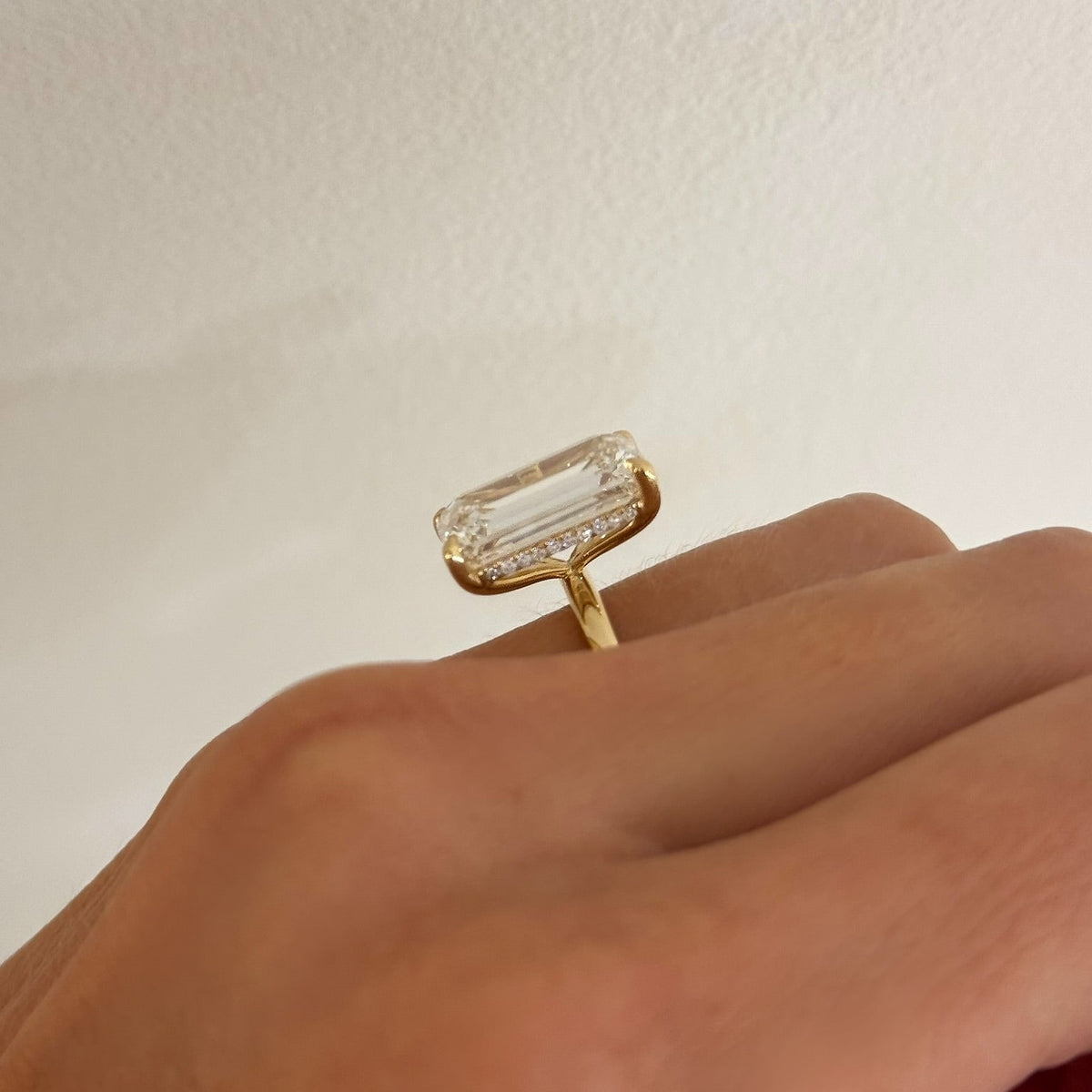 8.06ct Lab Grown Emerald Cut Diamond in a Solitaire Setting with Hidden Halo