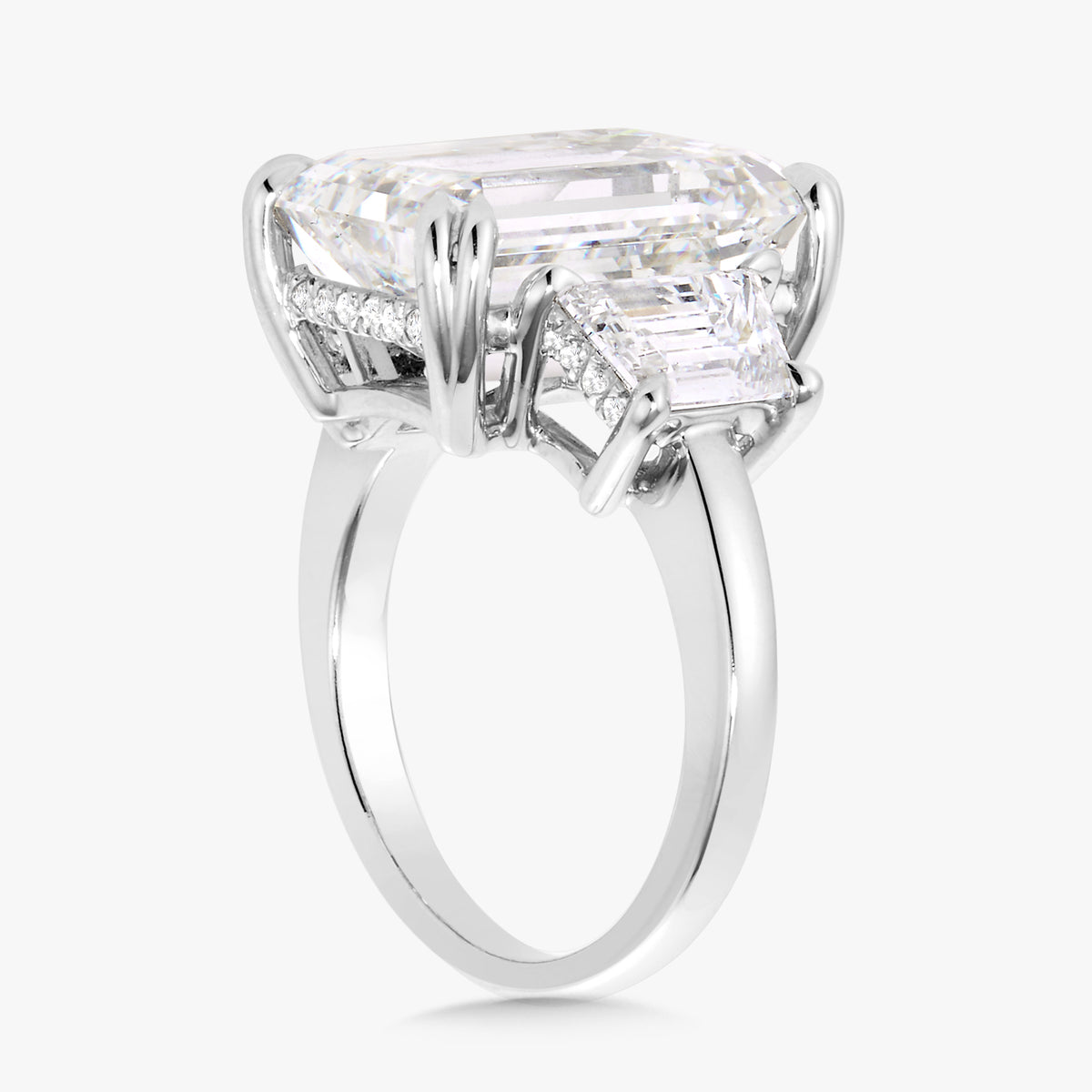 10.28ct Lab Grown Emerald Cut Diamond in a Three-Stone Setting with Step-cut Trapezoids