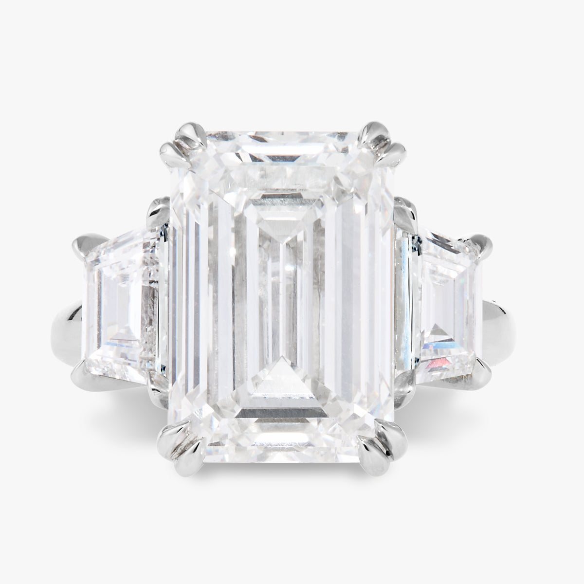 10.28ct Lab Grown Emerald Cut Diamond in a Three-Stone Setting with Step-cut Trapezoids