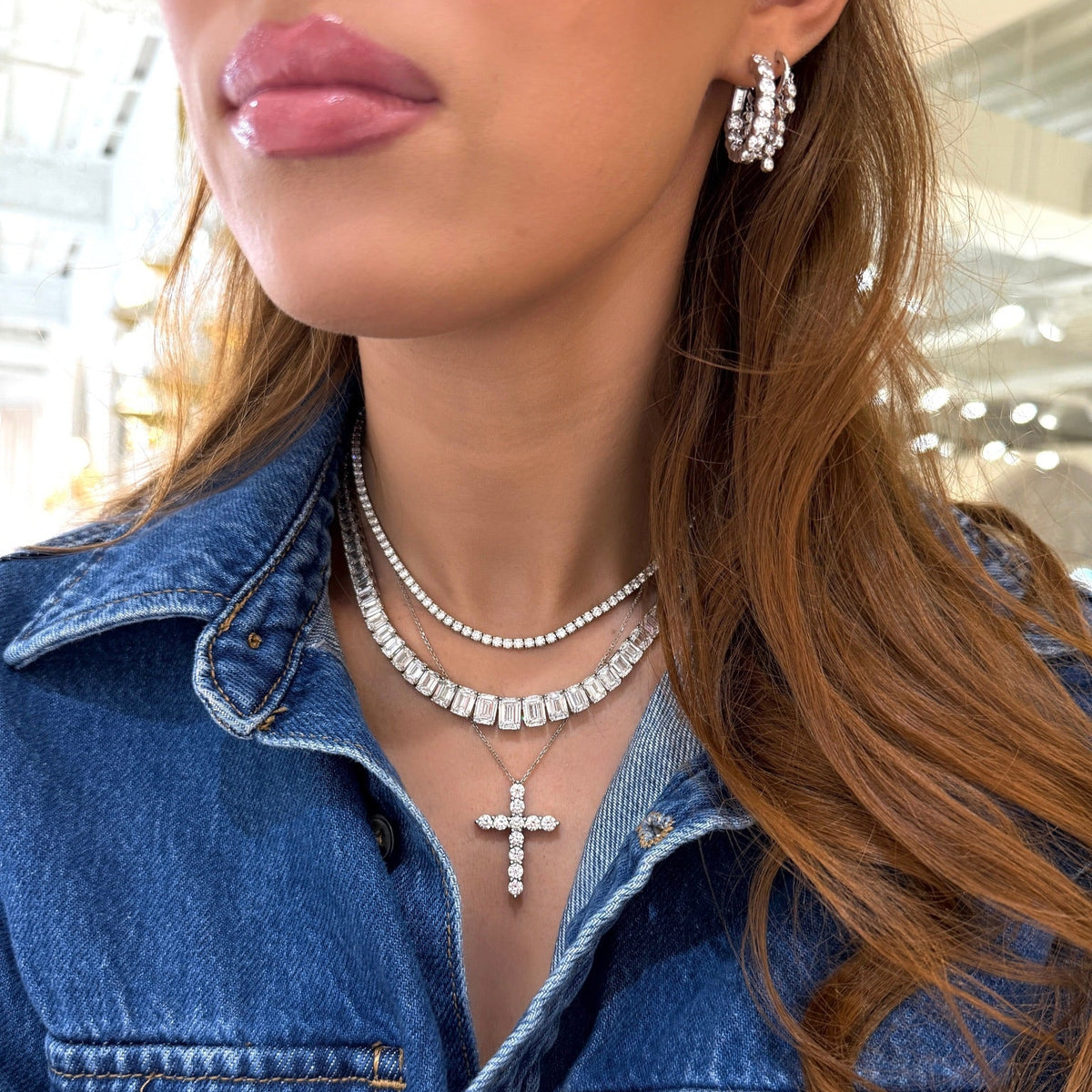 Kyle Graduated Emerald Cut Diamond Tennis Necklace 56.65 ctw, Georgie Two Prong Diamond Cross Necklace

