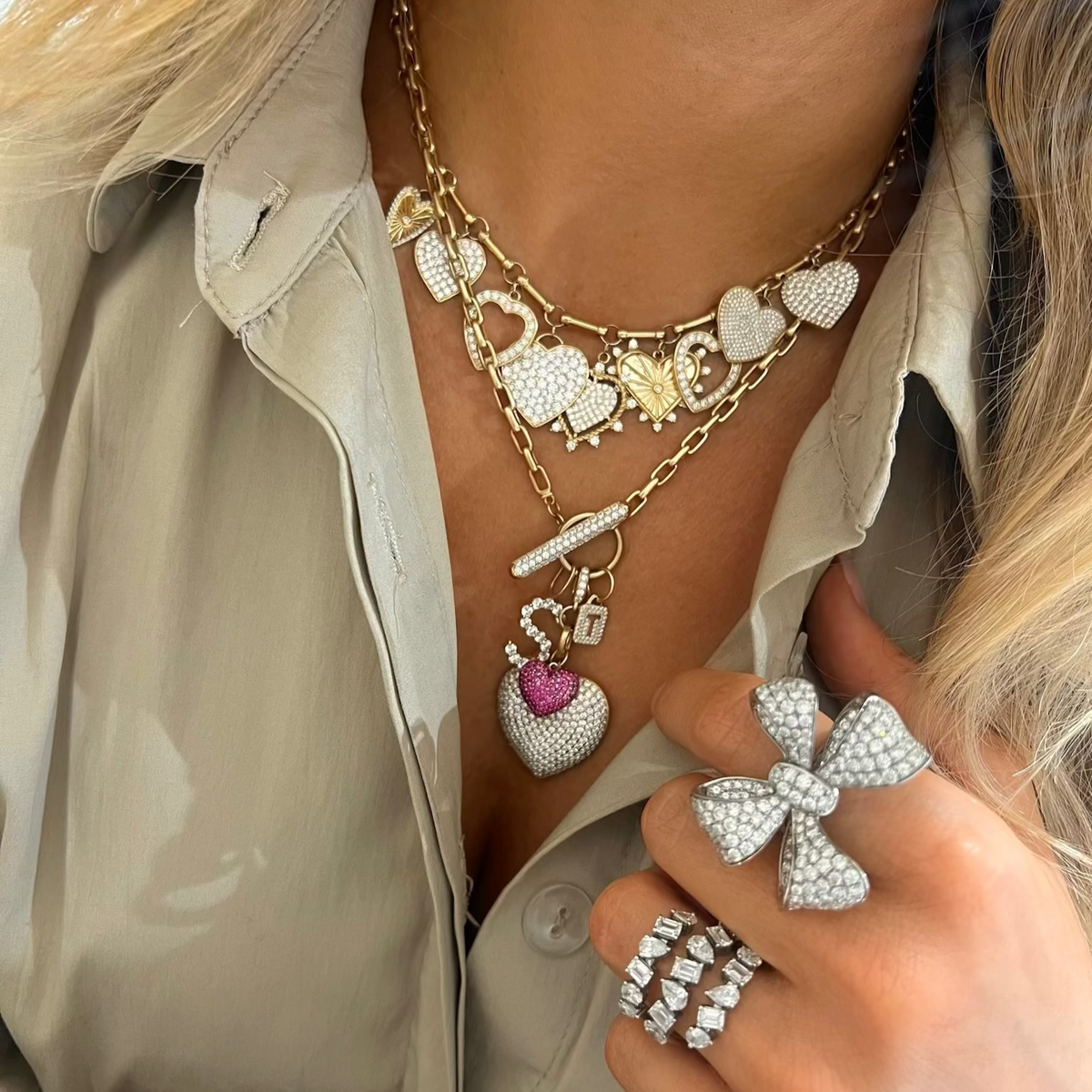 Martha May Pave Diamond Bow Cocktail Ring 5 ctw, Kehlani Three Row Multi Mixed Shape Diamond Band 3.59 ctw, Miss Matthews Dangling Adjustable Heart Charm Necklace 5.63 ctw, Hilton Diamond Toggle Necklace with Removable Pave Heart Charm and French Cable Chain, Large Initial Diamond Charm, Mini Pave Diamond Initial Charm, Reversible Pink Sapphire & Diamond Heart Charm