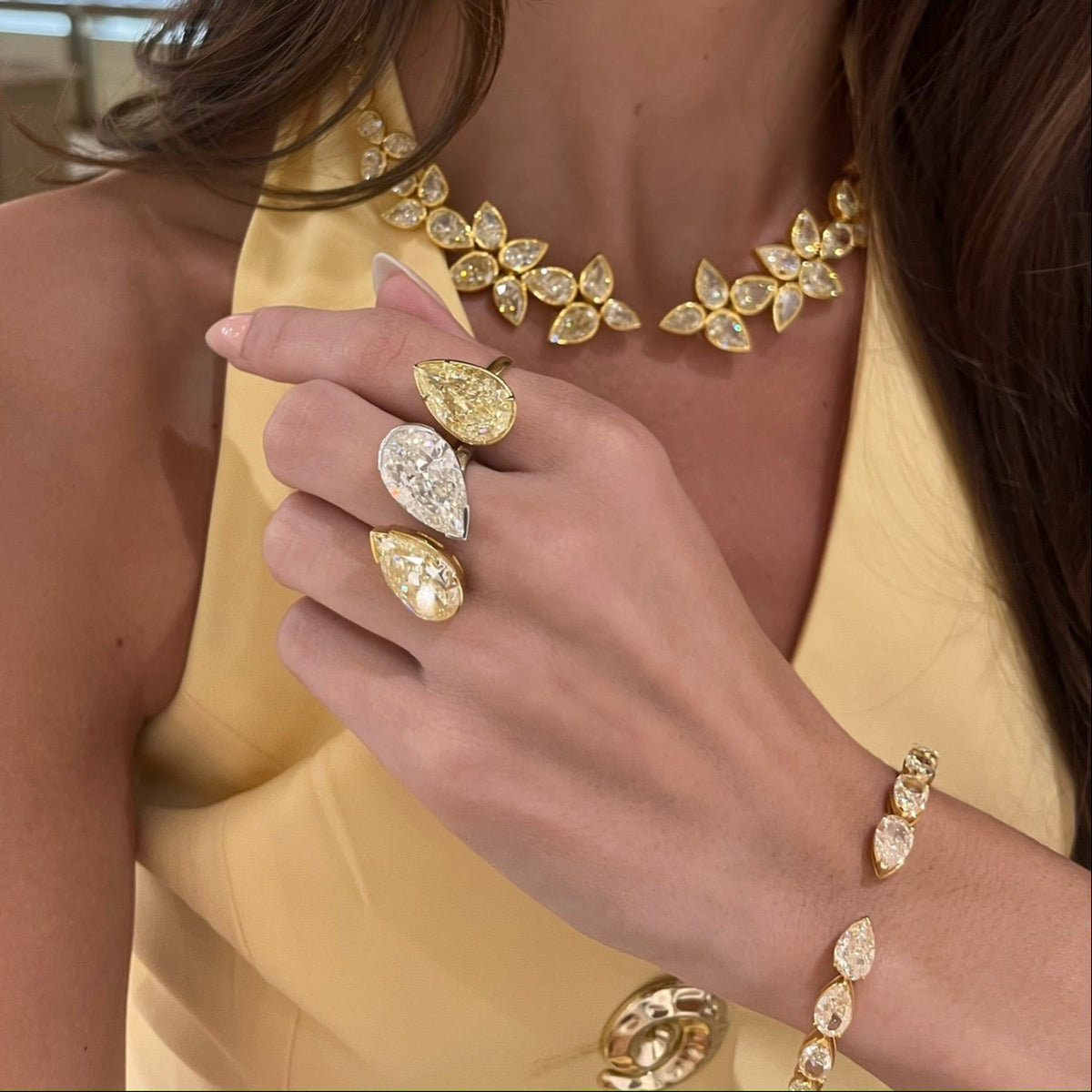 Natural Fancy Yellow Pear & Natural White Pear Diamond in a Two-Tone Toi Et Moi Setting, 10.02ct Natural Fancy Yellow Pear Diamond in a Bezel Set Solitaire Setting,Isadora Fancy Yellow Pear Flower Necklace Cuff 79.05 ctw,Graduated Fancy Light Yellow Pear Bangle Cuff 17 ctw