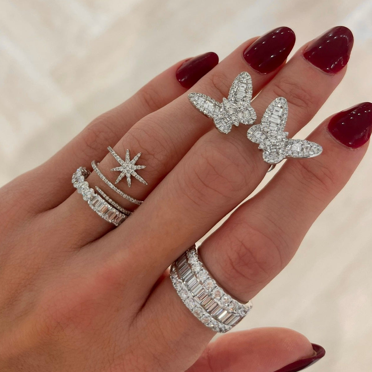 Ophelia Baguette Butterfly Ring, Best of Both Emerald Cut and Oval Eternity Band, Gianna Baguette Diamond Ring 3.08 ctw, Asteria Star Diamond Crossover Ring
