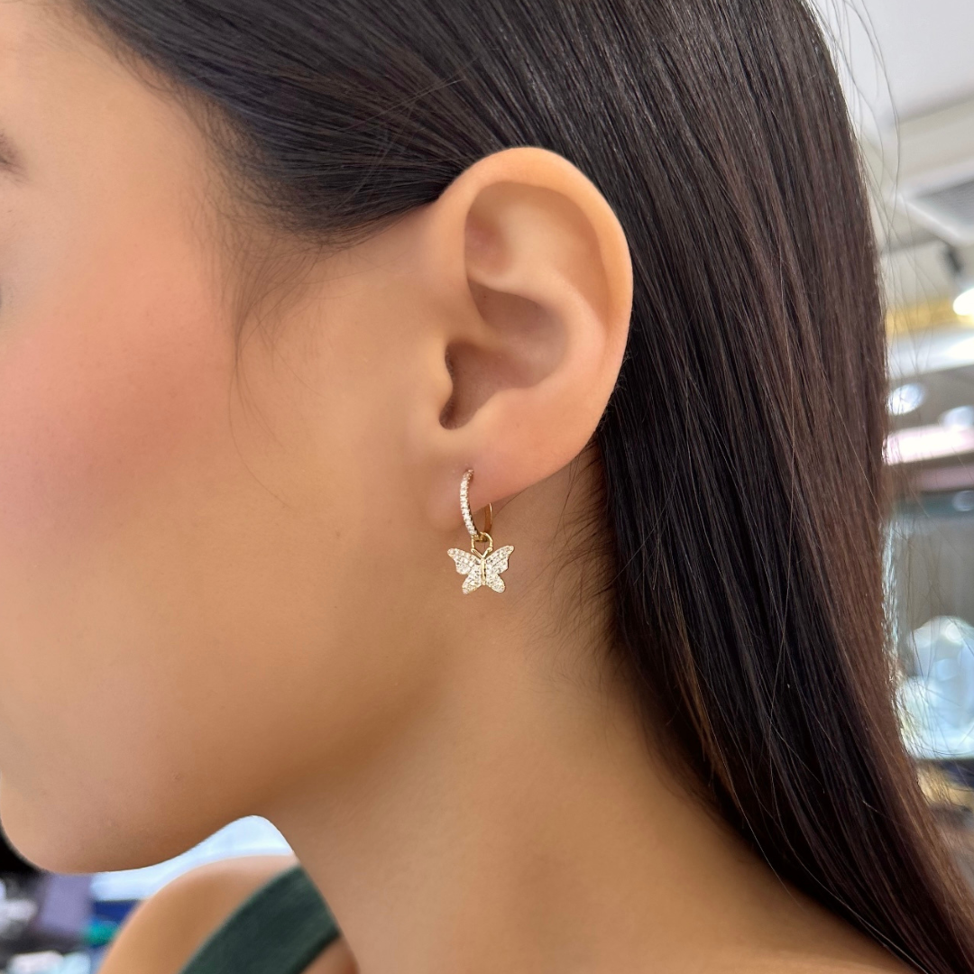 Butterfly huggie 2025 hoop earrings