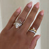 Aire Swirl Sideways Solitaire Pear Ring 0.64 ctw, Daisy Baguette & Round Alternating Diamond Band 1.64 ctw, Double V Band