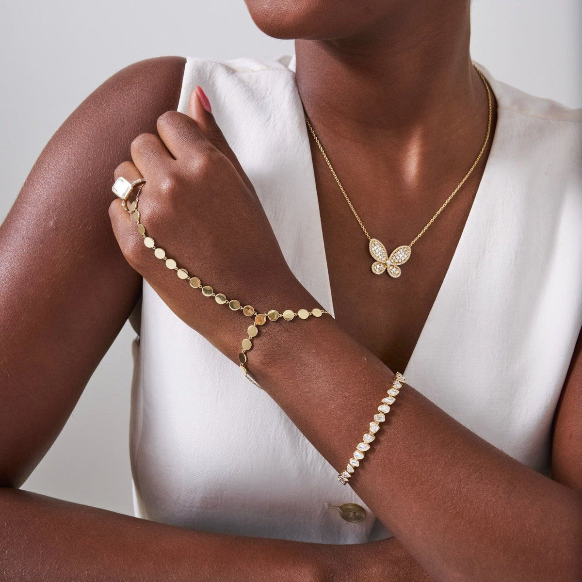 Round Gold Disk Hand Chain Bracelet, Bezel Set Pruitt Mixed Multi Shape Tennis Bracelet 7.23 ctw, Aurelia Asscher Cut Diamond Butterfly Necklace