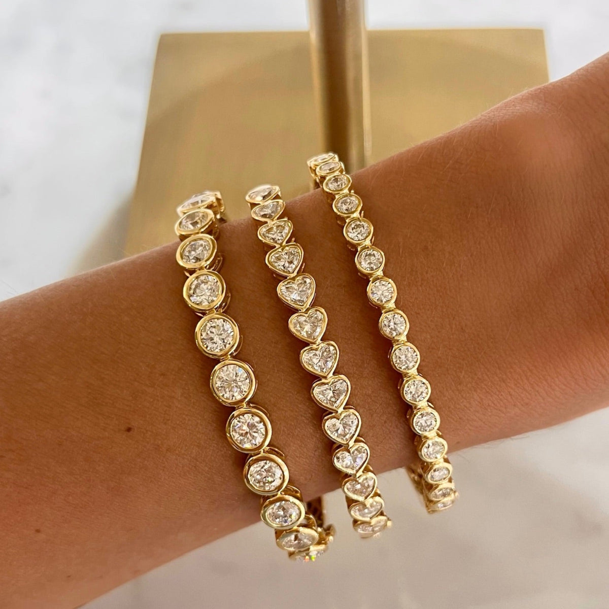 Round Diamond Bezel Bangle Bracelet 6.05 ctw, Mini Round Diamond Bezel Bangle Bracelet 2.50 ctw, Sideways Heart Shaped Diamond Bezel Bangle Bracelet 4.10 ctw