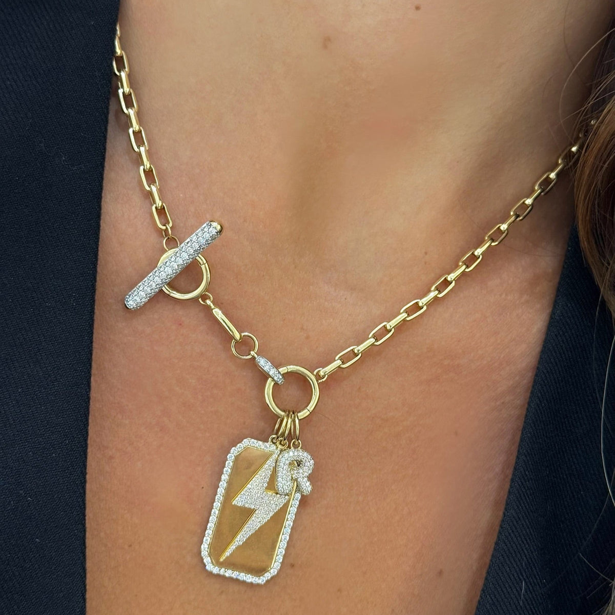 Skyler Pave Diamond Lightning Bolt Charm, Clipped Corners Gold Dog Tag with Diamond Outline Charm, Puffy Bubble Initial Pave Diamond Charm, Rectangle Rolo Chain With Diamond Toggle & Removable Lariat
