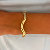 Welle Wavy Polished Gold Bangle Bracelet
