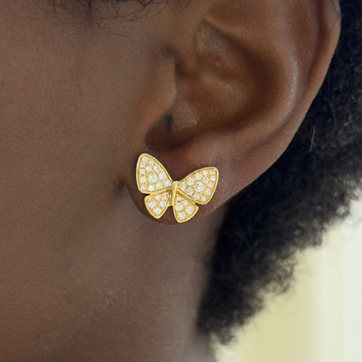 bellora butterfly stud earrings in YG