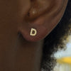 initial studs D