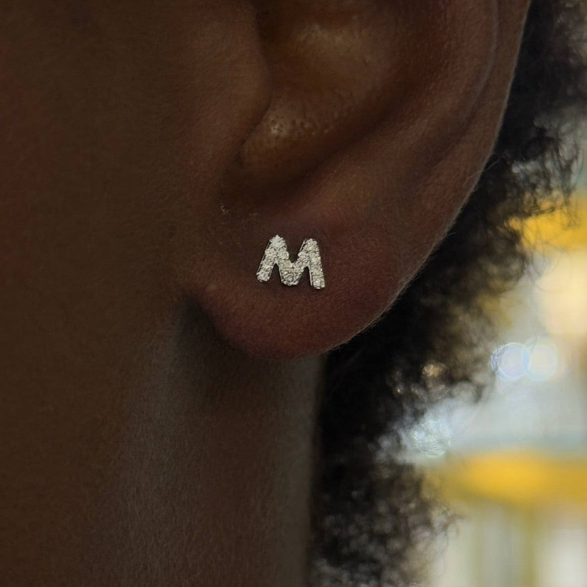 initial studs M