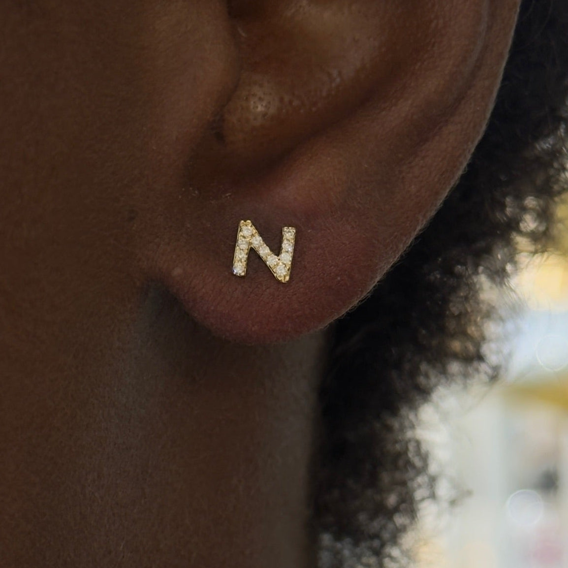 initial studs N