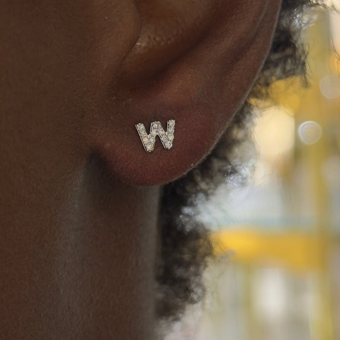 initial studs W