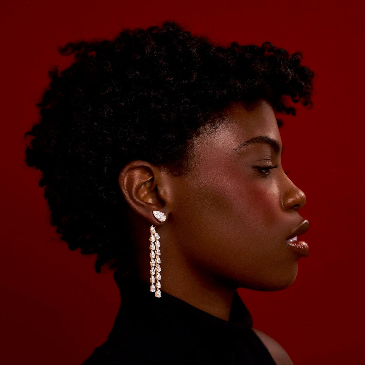 pear dangle earring backs paired with pear studs