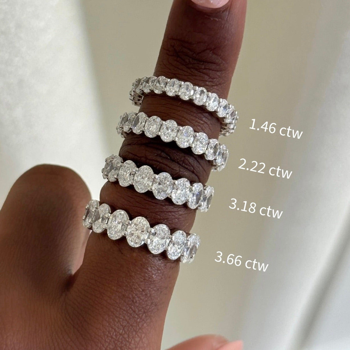 scalloped oval bands- 3.66 ctw, 3.18 ctw, 222 ctw, 1.46 ctw